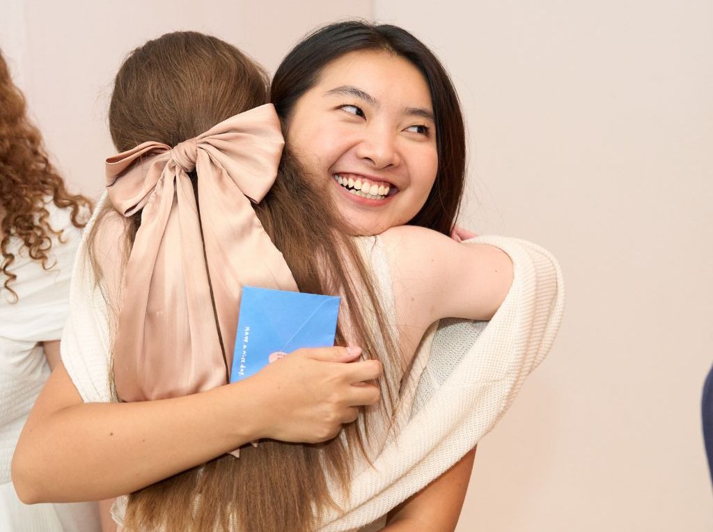 Graduation SeouLQuest Mentor Hugging Student Candid Happy HZ