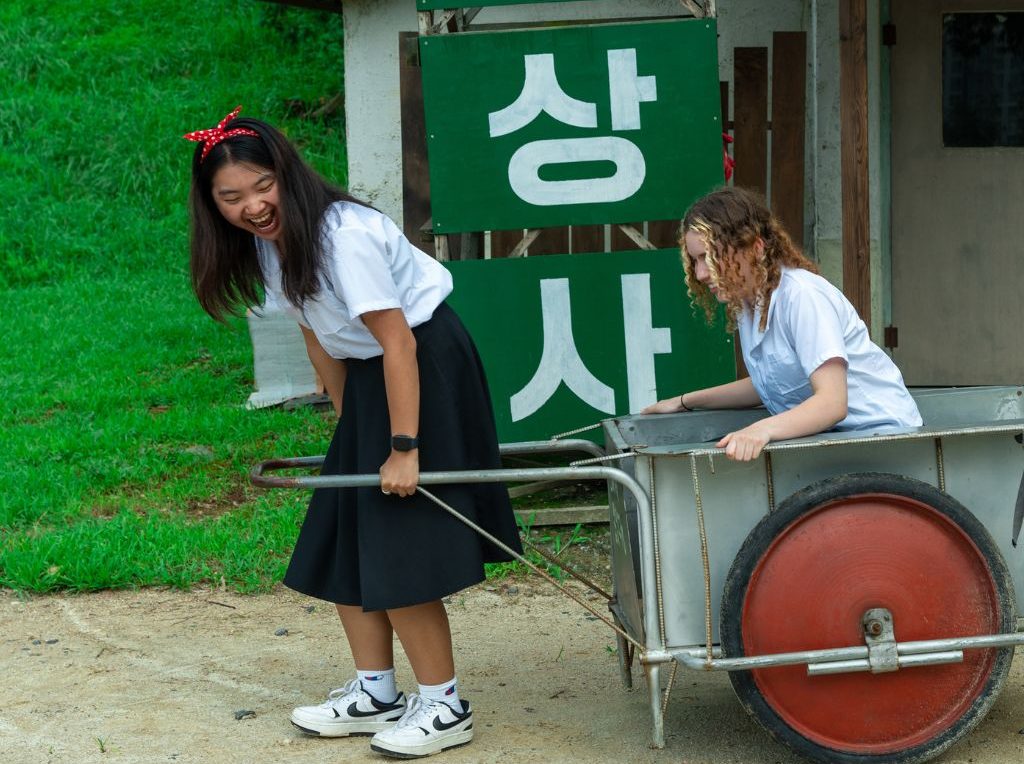 SeoulQuest Mentor Pulling Student in Wheelbarrow Happy Candid HZ
